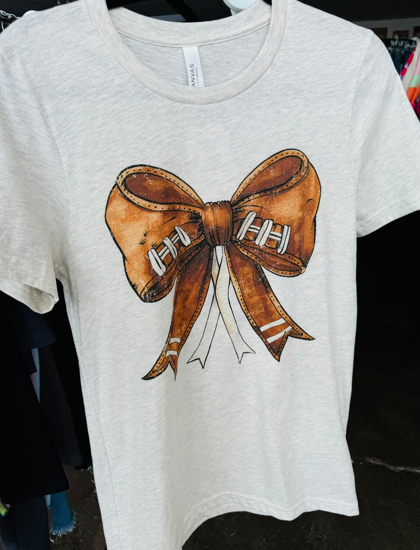 FOOTBALL BOW GRAPHIC TEE